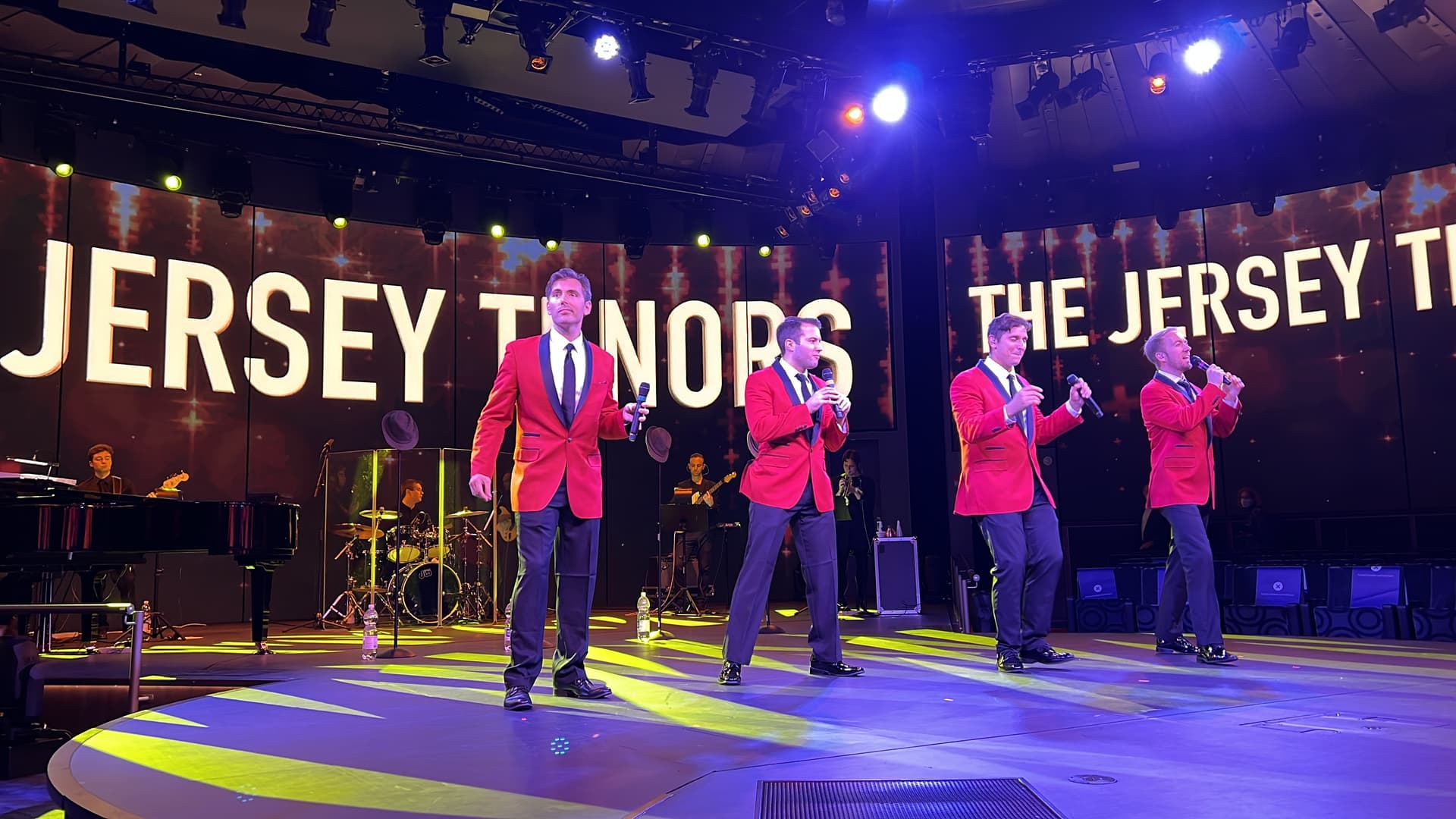 four tenors performing