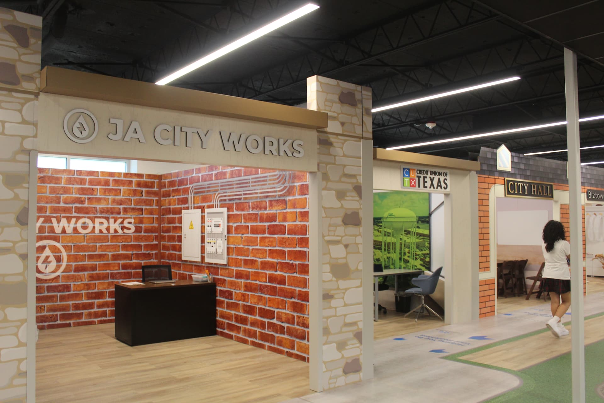 JA Biztown includes companies like Credit Union of Texas as well as a city works center. (Isabella Zeff/Community Impact)