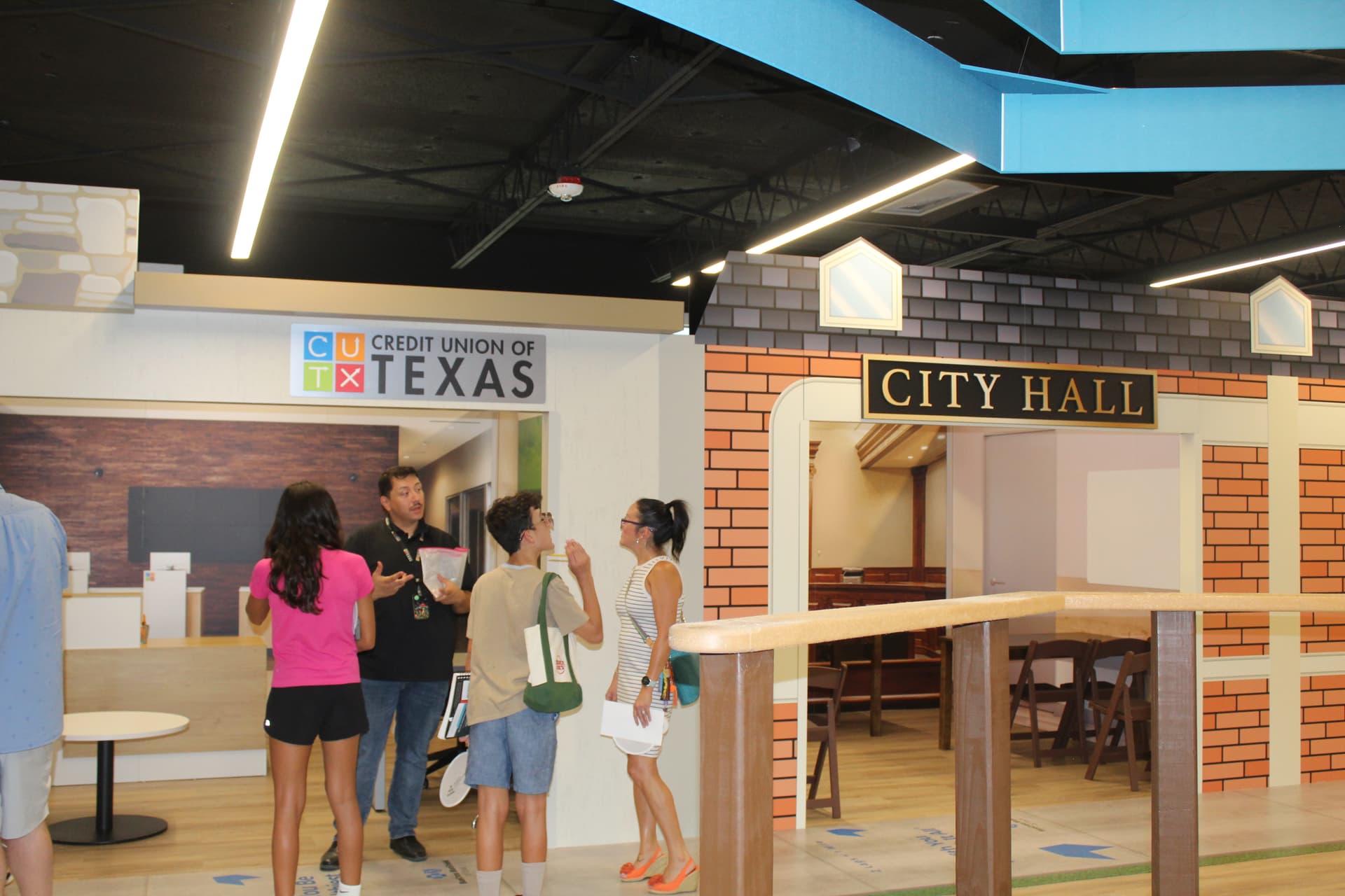 JA Biztown includes storefronts for Credit Union of Texas and a City Hall. (Isabella Zeff/Community Impact)