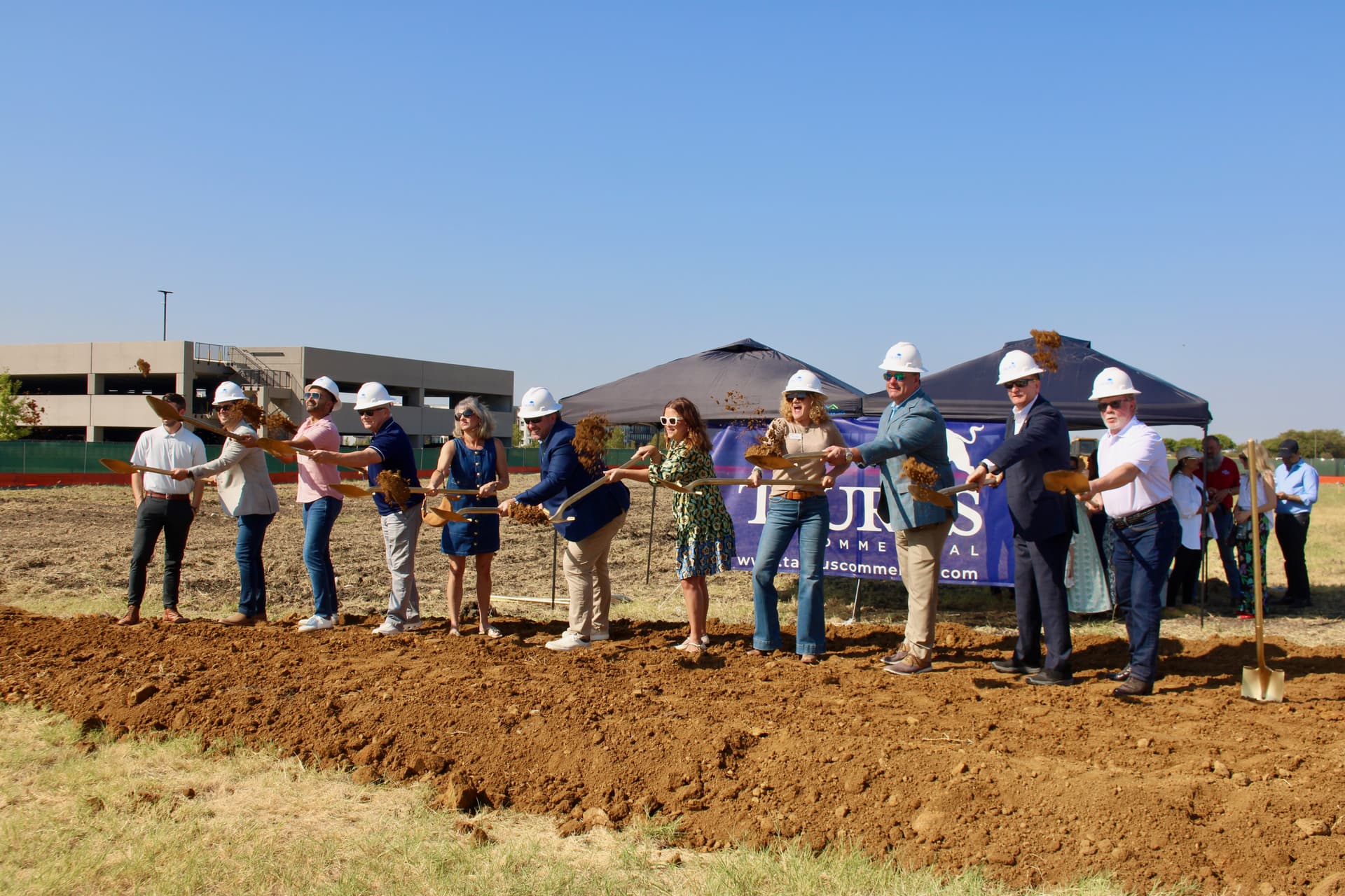 High 5 Exchange officials, project representatives and city leaders groundbreaking