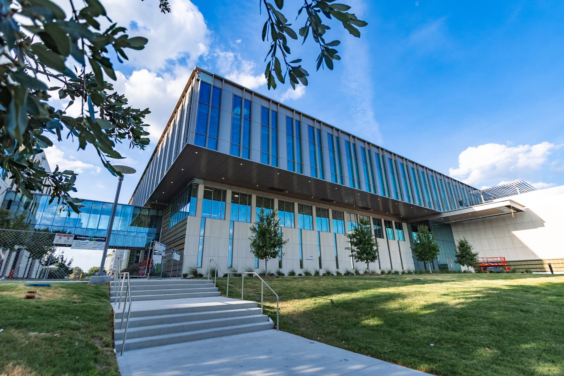 UT Dallas opens new business school building, nears completion on additional facilities