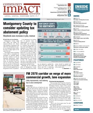 The Woodlands cover — May 2014