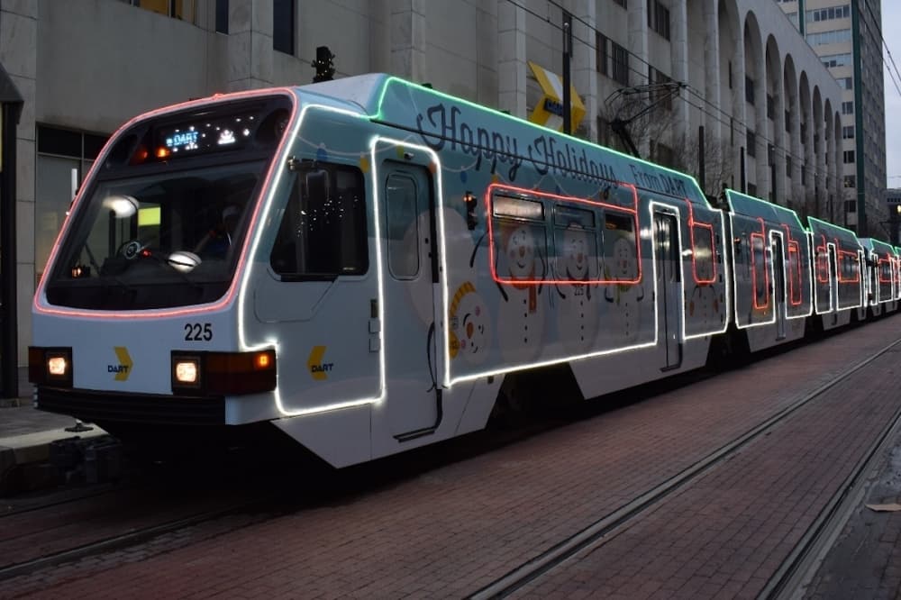 DART rolls out decorated holiday train, buses