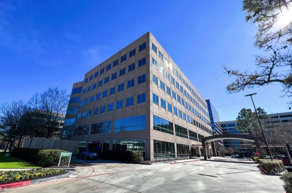 Woodforest National Bank acquires Town Center buildings on Lake Robbins Drive