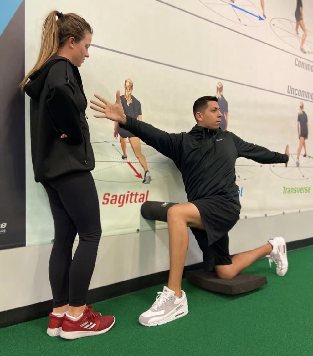 Train 4 the Game coach and client working out