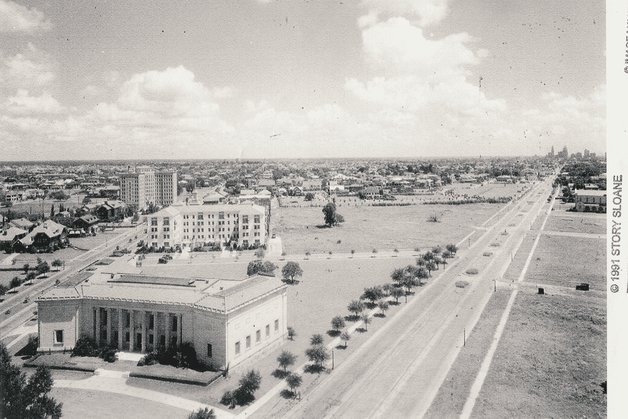Historic view of 5020 Montrose Boulevard and the former Plaza Hotel building in Houston’s Museum District, showcasing the early 20th-century streetscape and architecture.