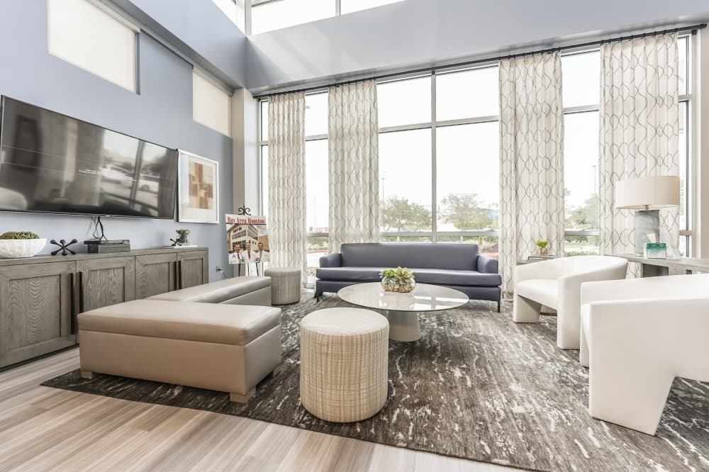 Comfortable and welcoming ER waiting room at Elitecare Emergency Hospital in League City, open 24/7 for abdominal pain care.