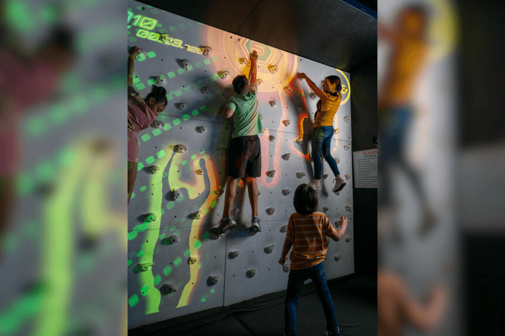 Children rock climb in Austin