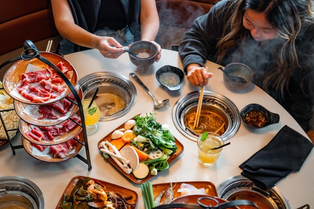 An image of some people enjoying a hotpot at the space.