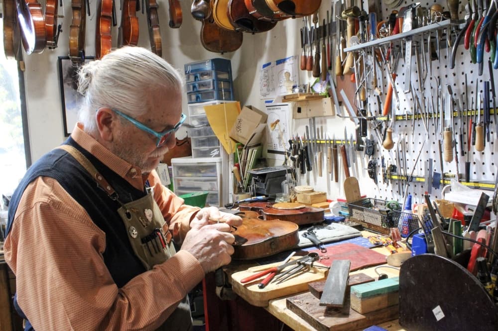 An image of the owner fixing an instrument.