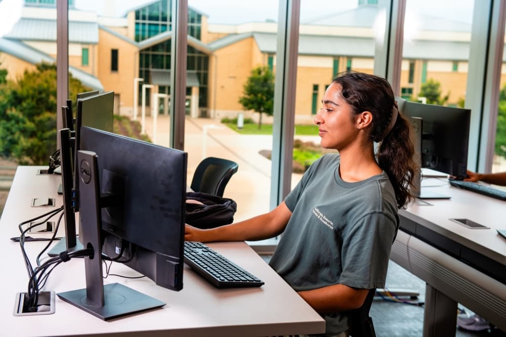 student looking at computer
