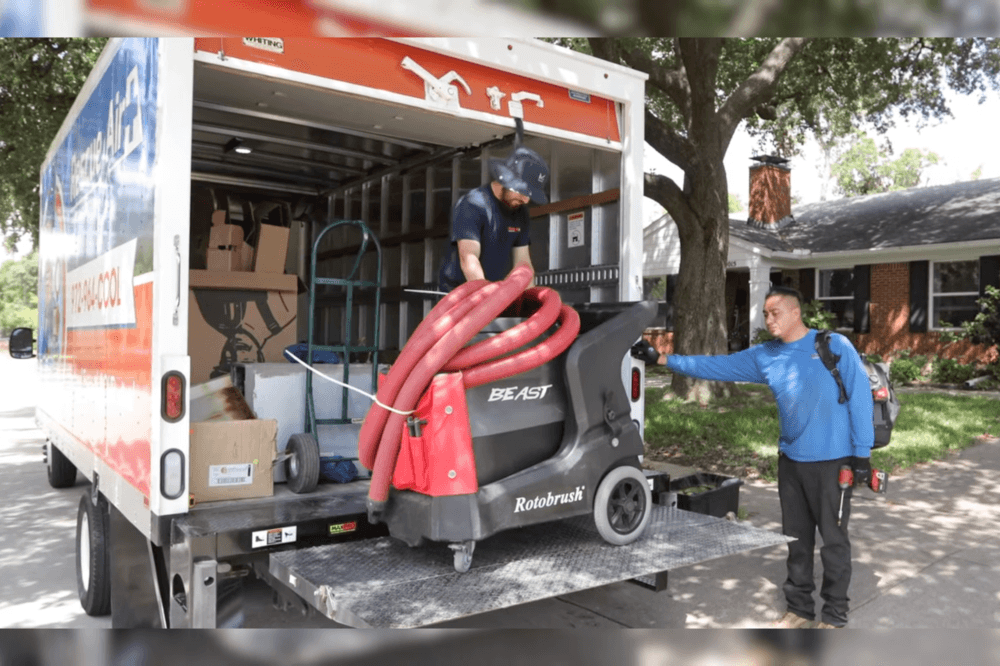 rescue air and plumbing team loading the truck