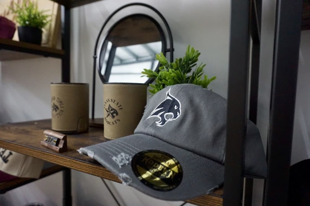 Family-owned and -operated custom apparel businesses expand into Kyle