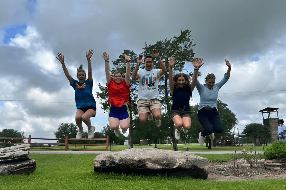 Camp Hope participants enjoy summer camp activities in Houston, creating a supportive environment for youth living with or affected by HIV through Allies in Hope.