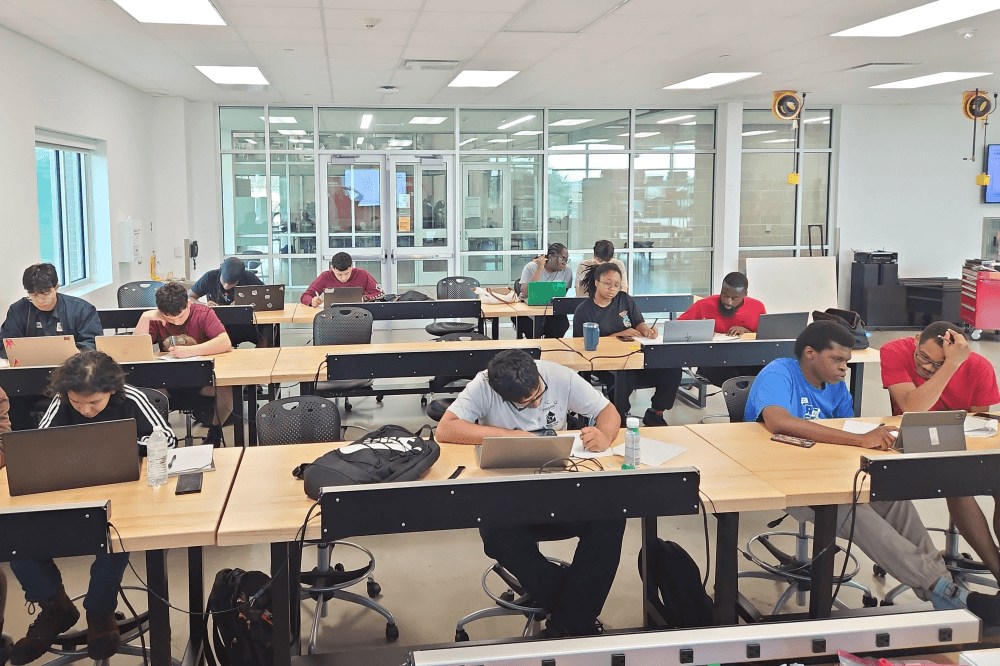 Houston City College students configure smart building technology equipment while learning networking, structured cabling, access control, security systems and commercial automation.