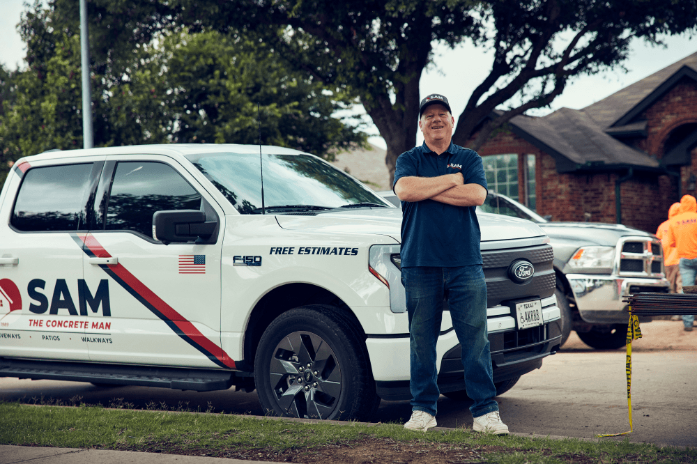 flory smiling by his truck