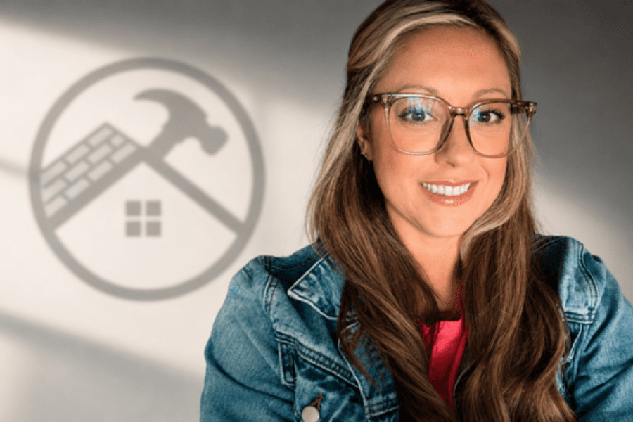 Smiling woman in glasses and denim jacket beside a home-repair logo of a house and hammer.