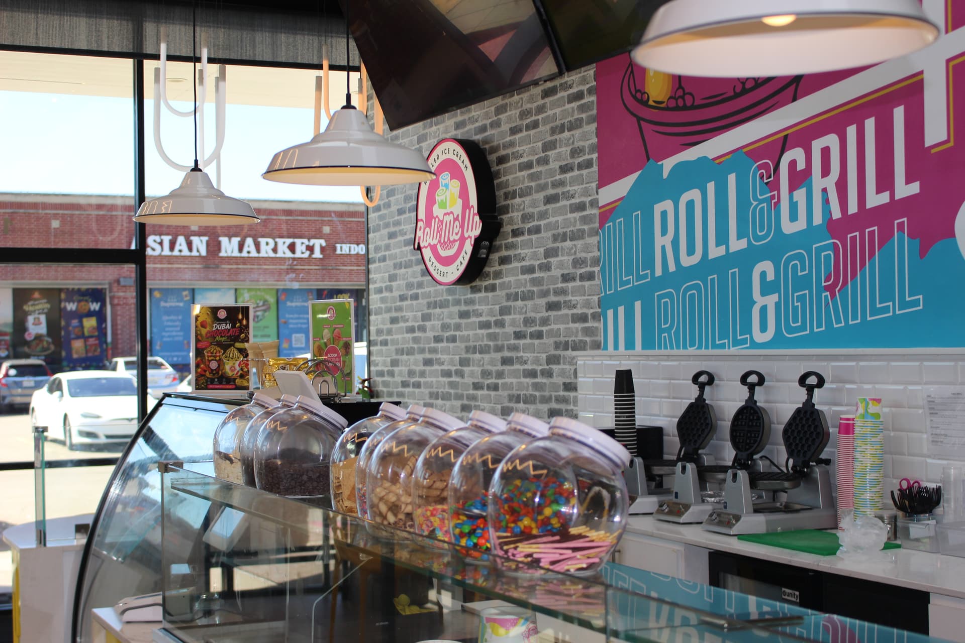Roll Me Up Ice Cream & Desserts offering rolled ice cream in Sugar Land