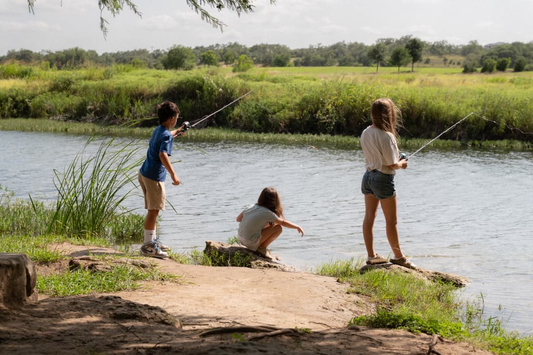 Three kids fishing