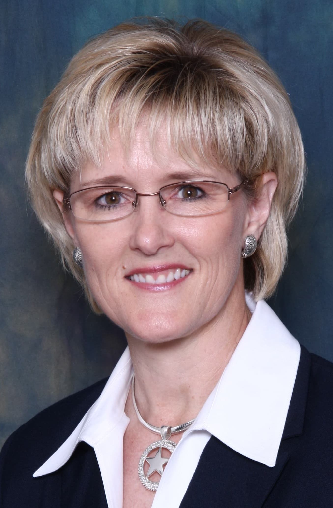 Valerie Covey* (R)