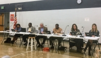 Franklin Special School District board meeting in gymnasium