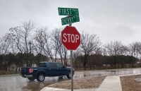 The corner of 1st Street and Cherry Street in downtown Frisco is one of three street signs that will be replaced following City Council's approval of the use of a numeral abbreviation for 1st Street. (William C. Wadsack/Community Impact Newspaper)