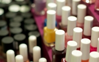 nail polishes on two shelves