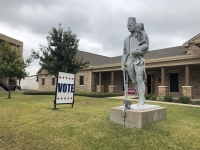 A sign guides voters in during the Nov. 6, 2019, election at Ben Hur Shrine Temple in North Central Austin. (Jack Flagler/Community Impact Newspaper)