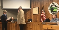 Mayor Linda Anthony swears in the new city administrator Travis Askey. (Amy Rae Dadamo/Community Impact Newspaper)