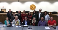 Members of the Leander City Council (seated) met with the Leander ISD board of trustees and Superintendent Bruce Gearing (standing) for a Feb. 11 joint meeting in Leander. During the nearly two-hour meeting, the elected bodies discussed common goals and challenges. (Brian Perdue, Community Impact Newspaper)