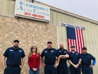 Owner Craig Tracy (third from left) and the staff of Ethridge Auto Center in Colleyville. (Photos by Ian Pribanic/Community Impact Newspaper)