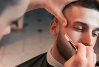 The men's salon offered a variety of services, including shaves. (Courtesy 18|8 Fine Men's Salon)