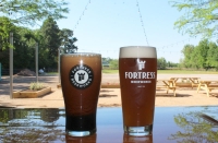 Fortress BeerWorks offers a taproom, featuring beers brewed on-site, as well as an outdoor patio and food trucks. (Eva Vigh/Community Impact Newspaper)
