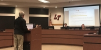 Robert Winovitch presented a change order request during a Feb. 19 board meeting. (Amy Rae Dadamo/Community Impact Newspaper)