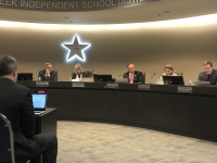 Steven Ebell (left) discussed the allocation of resources for English language arts and dual-language students with the Clear Creek ISD board of trustees at its regular meeting on Feb. 24. (Colleen Ferguson/Community Impact Newspaper)
