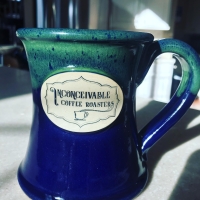 The business sells fresh, locally roasted coffees as well as apparel and coffee mugs. (Courtesy Inconceivable Coffee Roasters)