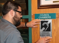 Friendswood City Hall assistive listening available sign