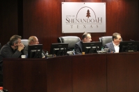 Mayor Ritch Wheeler and Council Members Michael McLeod, Charlie Bradt and Dean Gristy hear a presentation from public works Feb. 26. (Andrew Christman/Community Impact Newspaper)