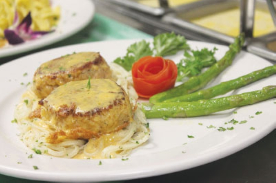 Ruggeri’s homemade crabcakes illustrate the restaurant’s mix of Italian and seafood. (Community Impact Newspaper file photo)