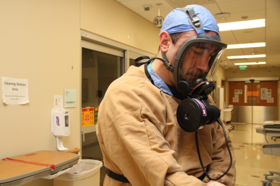 Mike Jaquez wears personal protective equipment May 28 at Houston Methodist West Hospital while assisting emergency room patients. (Courtesy Houston Methodist West Hospital)