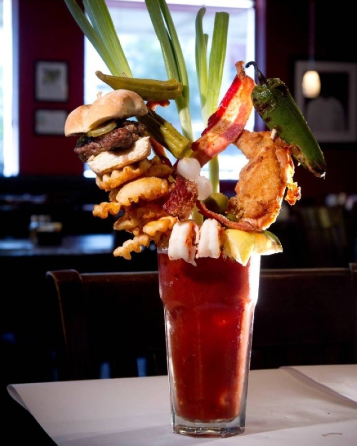This bloody mary includes a skewered slider, fried chicken, waffle fries and more. (Courtesy Chef Point Bar & Restaurant)