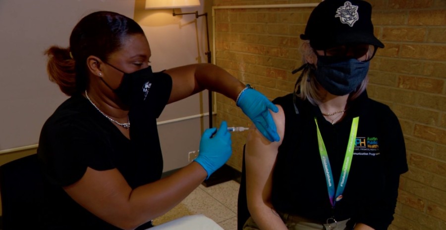 An influenza vaccination is administered at an Austin Public Health facility in late September.