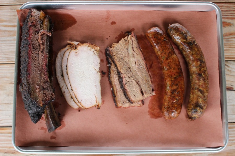 3rd Coast’s smoked meat offerings, cooked in a wood-fire pit and seasoned with housemade rubs, include ribs ($14 half rack, $28 rack), smoked turkey ($18 per pound), prime brisket ($24 per pound), and link sausage and boudin ($8 per pound). In addition to the full-size racks and one-pound servings, meats are also sold in quarter- and half-pound quantities.