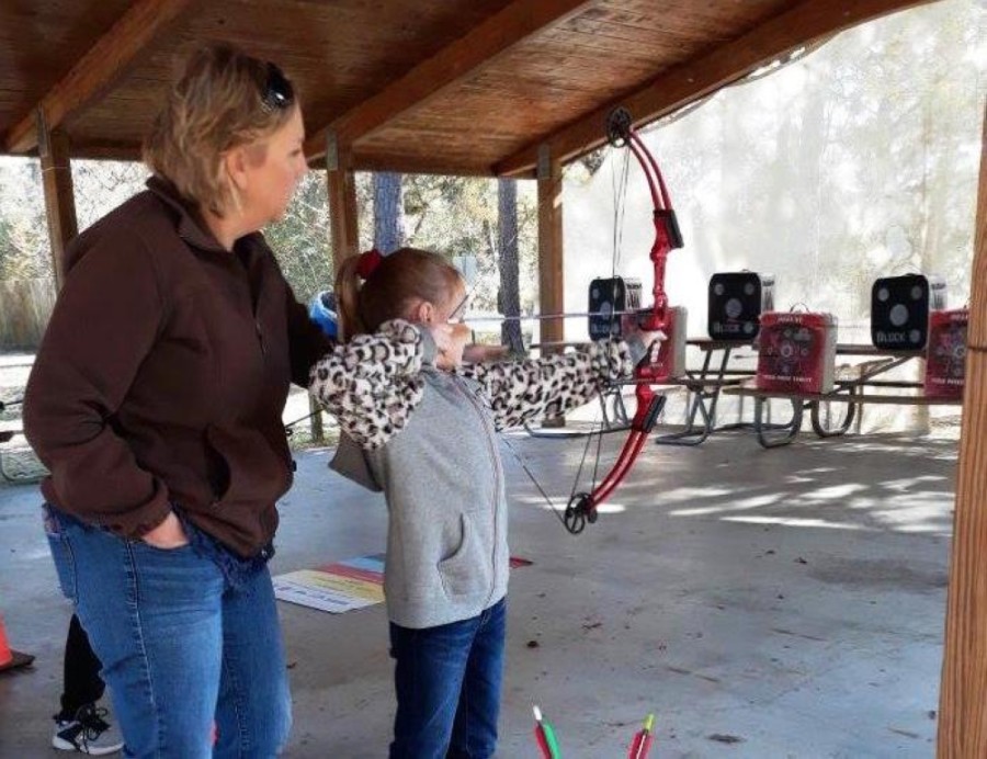Brazoria County Parks Department staff teaches the public to learn more about archery. (Courtesy Brazoria County Parks)