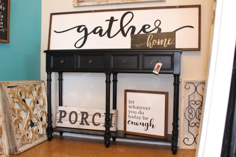 For those who love to decorate the home, Legacy Home Decor sells indoor signs. (Haley Morrison/Community Impact Newspaper)