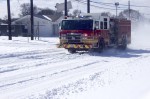 An Austin Fire Department truck drives down Manor Road on Feb. 15. (Jack Flagler/Community Impact Newspaper)