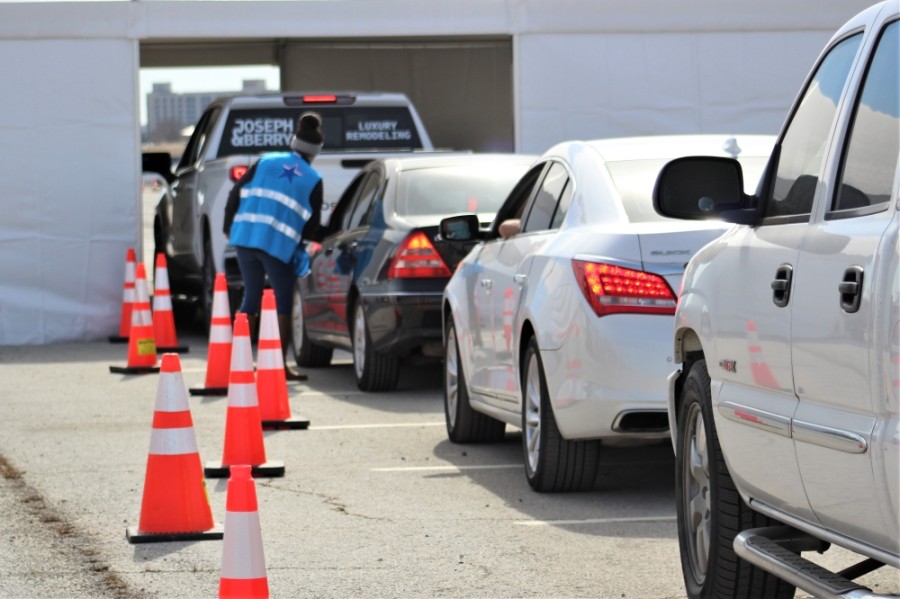 Cars wait their turn for a vaccine dose at the Texas Motor Speedway on Feb. 2. The hub was hosted by Denton County Public Health. (Sandra Sadek/Community Impact Newspaper)