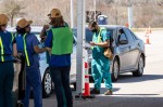 Photo of nurses offering drive-thru vaccines