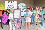 crowd with signs