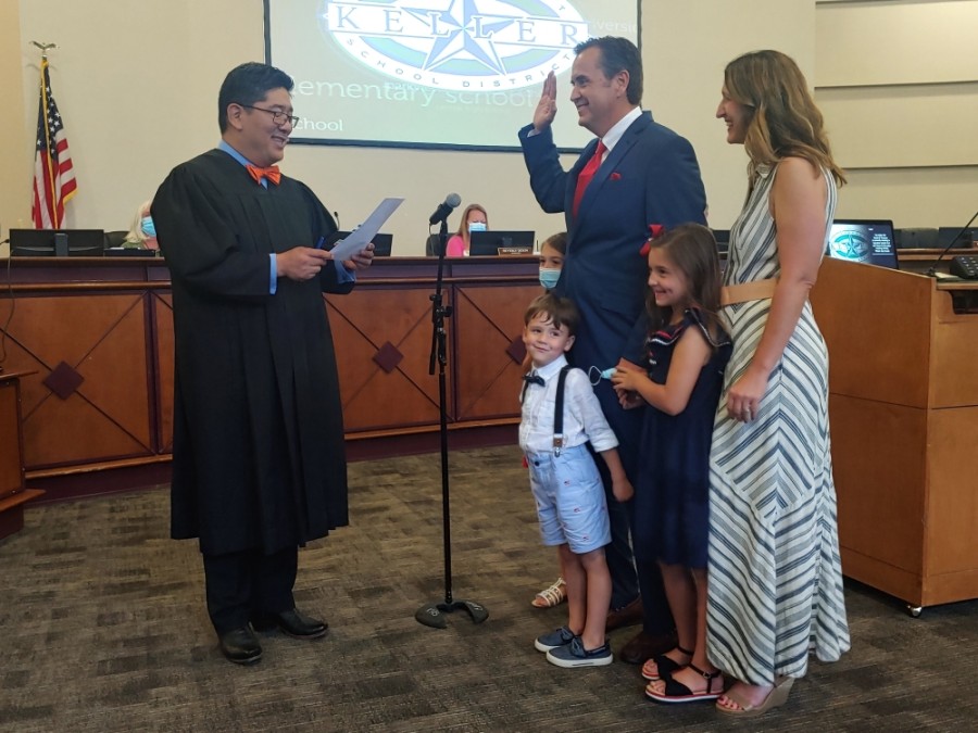 Dr. Charles Randklev is sworn in and is joined by his family and a judge